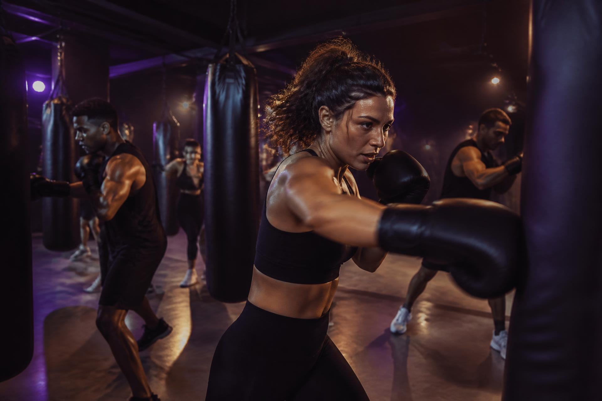STRYKFIT members training on heavy bags